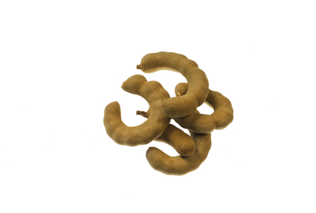 Group of ripe tamarind on white background.の写真素材