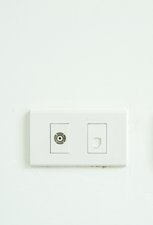 Electrical outlet in Thailand, tv or radio reciever socket on the wall.