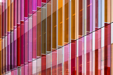 Brightly coloured plastic vanes on the side of a building in Oxfordの写真素材