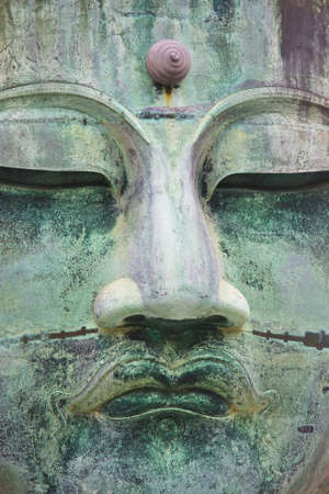 Close up of the bronze Buddha in Kamakura