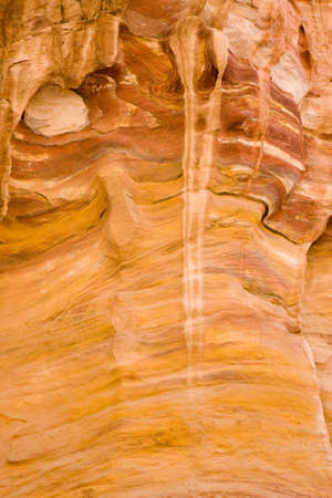 Patterns in brightly coloured stone at Petraの写真素材