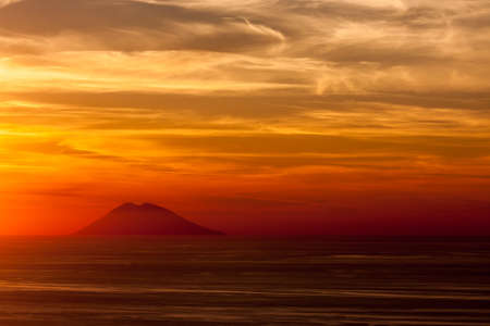 A view of Stromboli from mainland Italyの写真素材