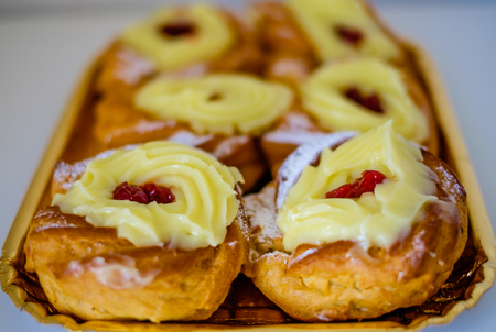 Verticall tray of authentic traditional Neapolitan pastries: fried donutsの写真素材