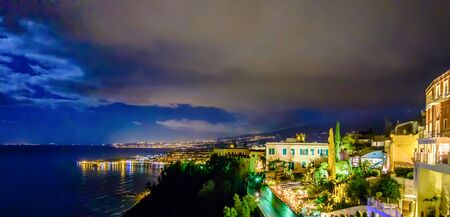 Taormina cloudy mediterranean moonlight. Ionian sea, Sicily, Italyの写真素材