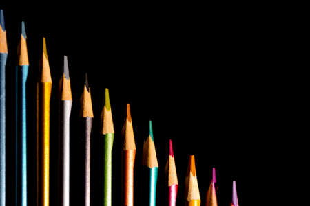 Set beautiful black, colored pencils of colored pencils on black background. Soon to school. Back to Schoolの写真素材