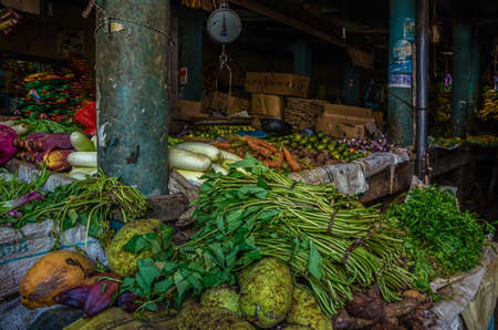 Market food street in Asia.Vegetables on market in Sri Lanka.Tropical fruit farmers.Outdoor market in Sri-Lanka.Buying oriental food.の写真素材