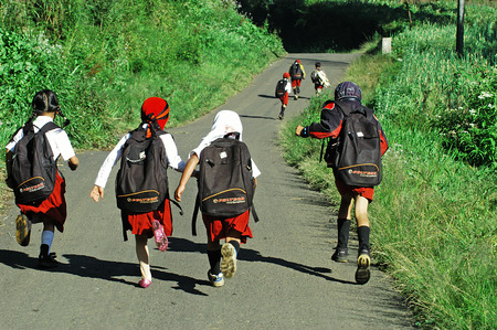 Childrens go to school in the village Ranupane, Lumajang, East Java, Indonesia. Photo taken on May 20th, 2009.のeditorial素材
