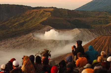 Tourists watching the sunrise and the crater of Mount Bromo Pananjakan, Pasuruan, East Java, Indonesia, on August 27, 2007.のeditorial素材
