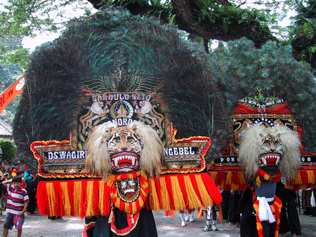 Performance traditional dance Reog Ponorogo in Ngebel lake, Ponorogo, East Java, Indonesiaのeditorial素材