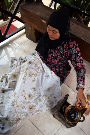 Disabled woman from the village of batik Tangjungbumi in Tresno Gallery, Bangkalan, Madura,...