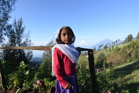 A little girl in the village around the mountain Semeru, Indonesiaのeditorial素材
