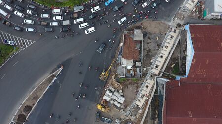 Aerial view traffic at the Bundaran Dolog, A yani Street in Surabaya, East Java, Indonesia on...