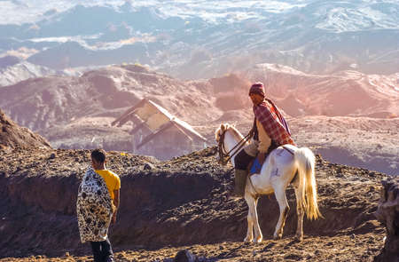 Horse service sellers wait for their customers near the crater of Mount Bromo, East Java, Indonesia on July 13, 2004のeditorial素材
