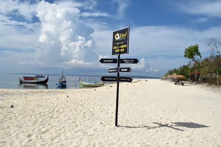 Madura, Indonesia - November 13, 2017: Signs for directions on Gili Labak Beach which has beautiful beaches and white sand in Sumenep, Madura, East Java, Indonesiaのeditorial素材