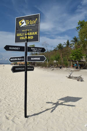 Madura, Indonesia - November 13, 2017: Signs for directions on Gili Labak Beach which has beautiful beaches and white sand in Sumenep, Madura, East Java, Indonesiaのeditorial素材