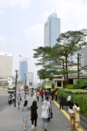 Jakarta, Indonesia - July 25, 2019: Human traffic in the Indonesian hotel roundabout area (bundaran...