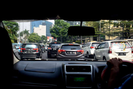 Jakarta, Indonesia - July 23, 2019: The view from a traffic jam car around the Grand Indonesia mall (Bundaran HI) Jakarta, Indonesiaのeditorial素材