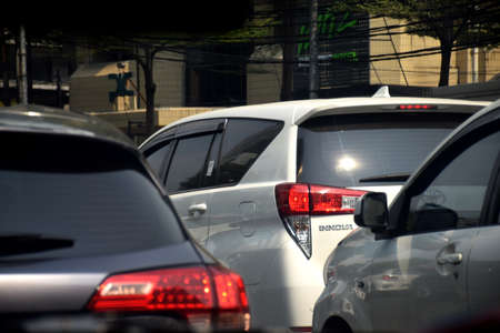 Jakarta, Indonesia - July 23, 2019: The view from a traffic jam car around the Grand Indonesia mall...