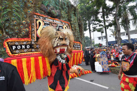 The Reog Ponorogo community begins a cultural parade at the celebration of the 724 anniversary of...