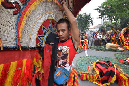 The Reog Ponorogo community begins a cultural parade at the celebration of the 724 anniversary of...
