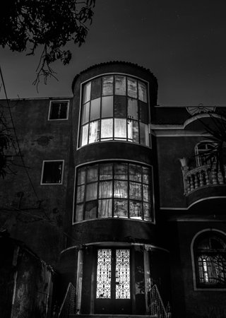 Old building at night. Black and white photo.の写真素材