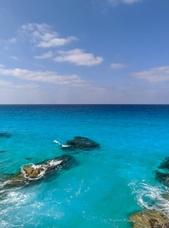 Tropical beach with turquoise water and blue sky.の写真素材