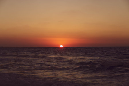 Sunset over the sea. Sunset on the sea. Beautiful sunset on the seaの写真素材