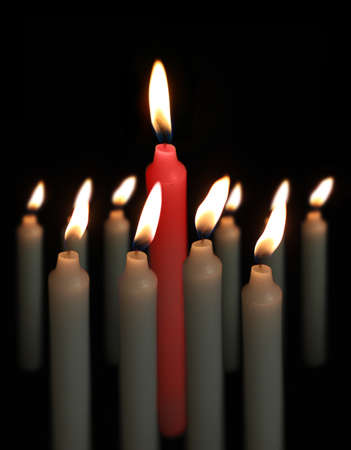 A single Red cadle surrounded by white candlesの写真素材