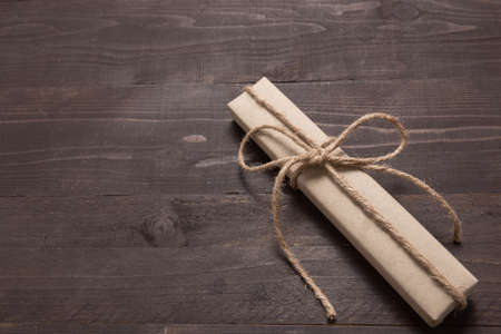 Gift box is on the wooden background with empty space.の写真素材