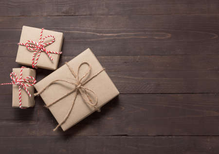 Gift boxes are on the wooden background with empty space.の写真素材