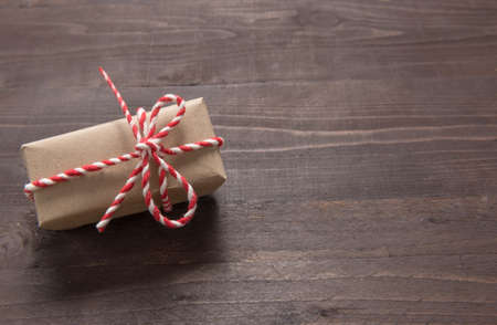 Gift boxes are on the wooden background with empty space.の写真素材