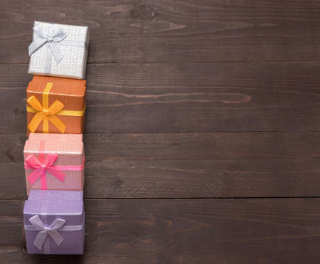 Gift boxes are on the wooden background with empty space.Image ID:432703999の写真素材