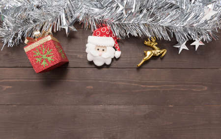 Decoration of Christmas day on the wooden background with empty space.の写真素材