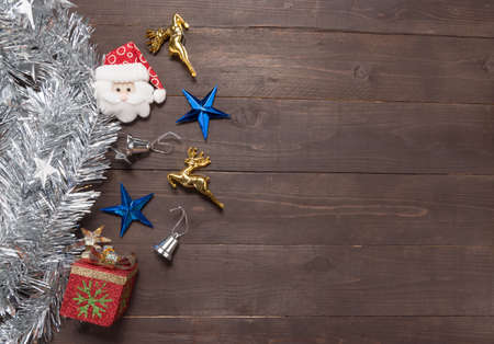Decoration of Christmas day on the wooden background with empty space.の写真素材