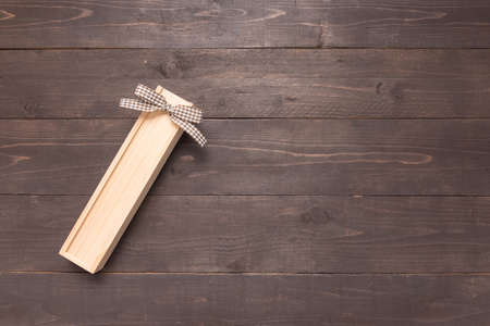 Gift box is on the wooden background with empty space.の写真素材