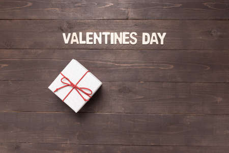 Gift boxes are on the wooden background with empty space.の写真素材