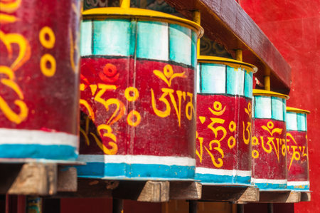 Prayer wheels in front of a temple, Varanasi, Indiaのeditorial素材