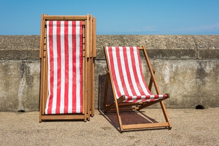 Deckchairs ready for use at a typical English seaside promenade の写真素材