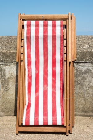Deckchairs ready for use at a typical English seaside promenade の写真素材