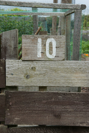 Wooden sign giving garden plot numberの写真素材