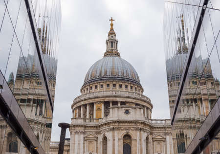 St Paul's Cathedral in London, against a cloudy sky. By the architect Sir Christopher Wren.の写真素材
