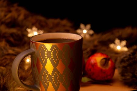gold lights and coffee in winter decorationsの写真素材