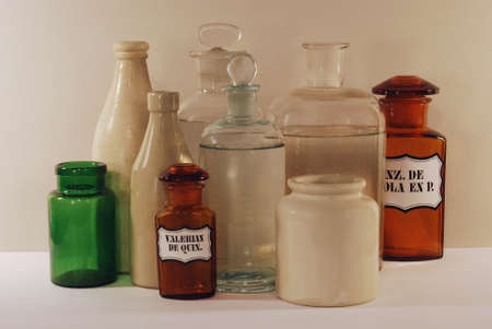 Group of antiques glass flasks and stoneware potsの写真素材