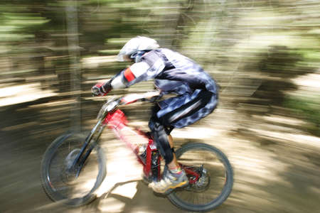 Downhill mountain bike racerの写真素材