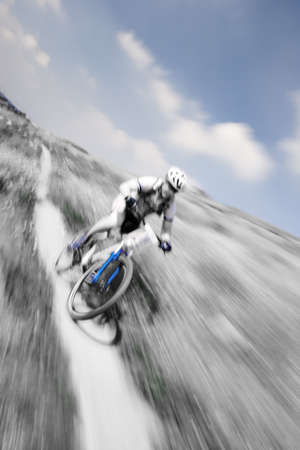 Competitor in a downhill mountain bike raceの写真素材