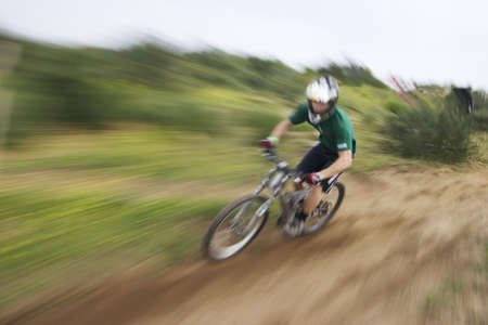 Downhill mountain bike racerの写真素材