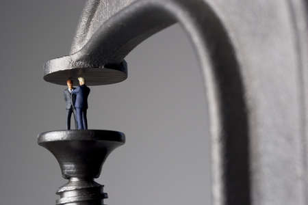 Businessmane in a clampの写真素材