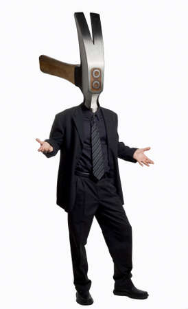 Businessman with a hammer as his head.の写真素材