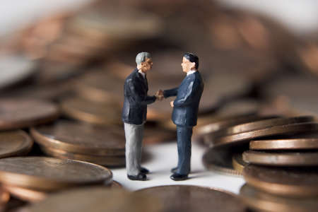 Business figures with money.の写真素材