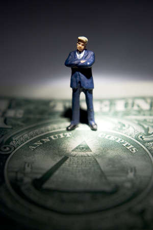 Business figures with money.の写真素材